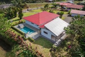 an overhead view of a house with a red roof at Casa Alexa Venecia in Venecia
