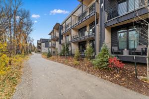 an empty sidewalk in front of a apartment building at Apres Shores #C13 in Silverthorne
