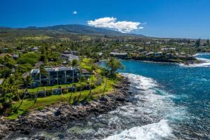 an aerial view of a resort on the shore of the ocean at Spacious 2BR Oceanfront Loft - Unit C17 condo in Lahaina