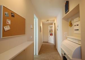 a hallway of a room with a hospital bed and a hallway at B&B Incanto sotto il mare in San Benedetto del Tronto