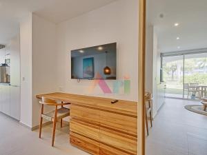 a kitchen with a wooden desk in a house at Suite studio à Anse Marcel - 2 pers. - FR-1-734-87 in Marigot