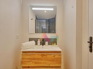 a bathroom with a sink and a mirror at Suite studio à Anse Marcel - 2 pers. - FR-1-734-87 in Marigot +21 photos