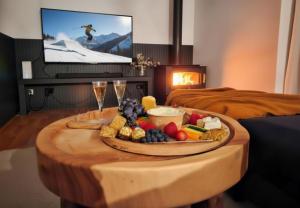 a tray of food on a table in a room at Lake Kami Retreat - Jindabyne in Jindabyne