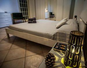 Postel nebo postele na pokoji v ubytování Casa vacanze Letto & Latte