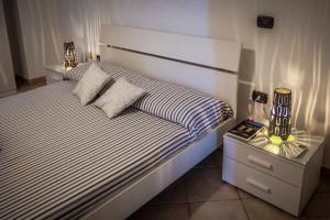Postel nebo postele na pokoji v ubytování Casa vacanze Letto & Latte