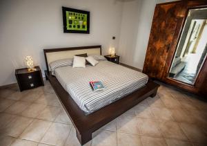 Postel nebo postele na pokoji v ubytování Casa vacanze Letto & Latte