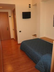 Postel nebo postele na pokoji v ubytování Hotel Selide