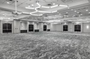a large room with a large ballroom with a large floor at Hilton Garden Inn Sioux Falls South in Sioux Falls