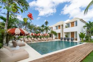 an image of a swimming pool at a villa at The Balangan Hotel Uluwatu - 2min to Beach & 5min to Bali's Best Golf in Uluwatu