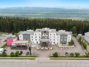 an aerial view of a large building with a parking lot at Velora Hinton, an Ascend Collection Hotel in Hinton
