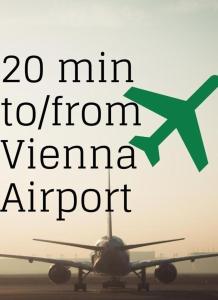 a plane is on the runway with the words min from vienna airport at Simply Sleepy - Self Check-in in Götzendorf an der Leitha