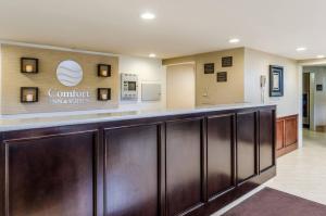 a bar at a hospital with a sign that reads comfort inninis at Comfort Inn & Suites West Springfield in West Springfield +31 photos