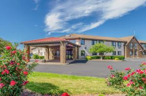 a rendering of a house with a driveway at Comfort Inn & Suites West Springfield in West Springfield