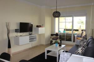TV a/nebo společenská místnost v ubytování Benalmádena Del Mar Apartments