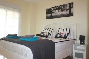 Postel nebo postele na pokoji v ubytování Benalmádena Del Mar Apartments