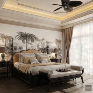 a bedroom with a large bed and a ceiling fan at Đại Cồ Việt Hotel Ninh Bình in Kỳ Vĩ