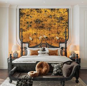 a bedroom with a large bed with a large painting on the wall at Đại Cồ Việt Hotel Ninh Bình in Kỳ Vĩ +8 photos