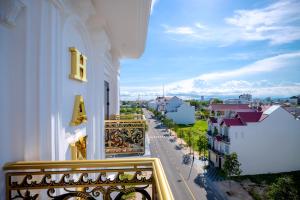 a balcony of a building with a view of a street at Hanah Hotel Phan Thiet in Phan Thiet