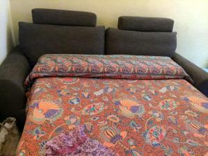 A bed or beds in a room at La Musica del Mare