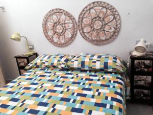 A bed or beds in a room at La Musica del Mare