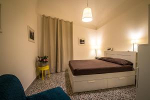 Posteľ alebo postele v izbe v ubytovaní Casetta del Mar