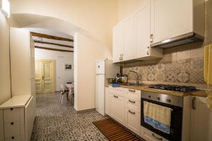 Kuchyňa alebo kuchynka v ubytovaní Casetta del Mar