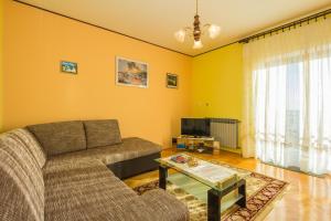 TV a/nebo společenská místnost v ubytování Apartments Villa Luciana