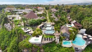 an aerial view of a resort with two swimming pools at Biu Biu Resort Bali in Jimbaran