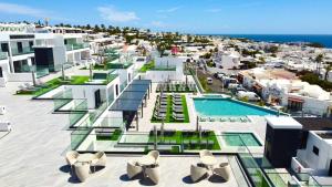 an aerial view of a resort with a swimming pool at Hotel Royal Atlántico in Puerto del Carmen