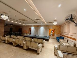 a large room with a pool table and chairs at Hotel Indo Tiger by RawatHospitality in Tembhuida +34 photos