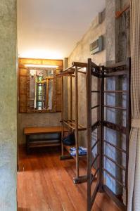 a room with a bunk bed and a bench at Lion Cafe Resort in Ban Huai Sieo +81 photos