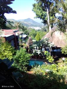 a view of a resort with a swimming pool at Pumba's Lookout in Barberton