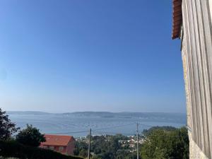 a view of the water from a building at Lar do Mar in Beloso