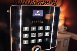 a close up of a cell phone at Arena Hotel in Gelsenkirchen +48 photos
