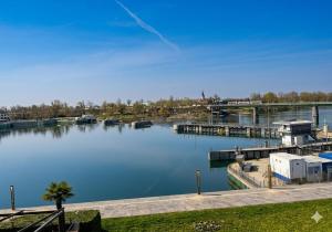 a large body of water with a marina at Villa Aurora in Breisach am Rhein