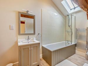 a bathroom with a sink and a shower at 1 Bed in Bucknell oc-94662 in Letton +26 photos