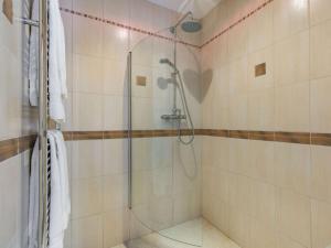 a shower with a glass door in a bathroom at 1 Bed in Ludlow oc-chl23 in Orleton