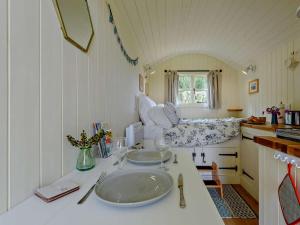 a kitchen with a large sink in a room at 1 Bed in Hereford oc-93441 in Little Dewchurch