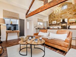 a living room with a couch and a table at 2 Bed in High Peak oc-94059 in New Mills