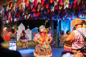 a group of people dancing in a performance at La Torre Resort All Inclusive in Porto Seguro +121 photos
