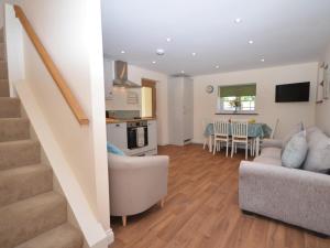 a living room with a couch and a dining room at 2 Bed in Bristol oc-75697 in Bristol