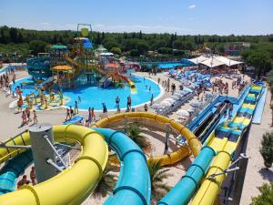 a large water park with people playing in it at Mobilhome Maja in Pirovac