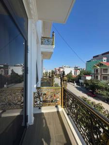 a balcony of a building with a view of a street at Sky Night Hotel 2 in Việt Yên +12 photos