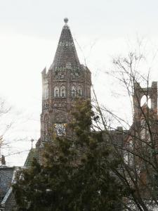 a building with a tower with a clock on it at Superior - Appartement Amélie in Potsdam