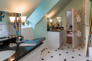 a bathroom with a sink and a mirror at Bohemia Manor Farm in Chesapeake City