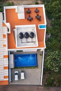 an overhead view of a house with a pool at Pearl Diamond Resort in Trincomalee