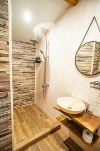 a bathroom with a sink and a shower at Green View 2 in Skrino +27 photos
