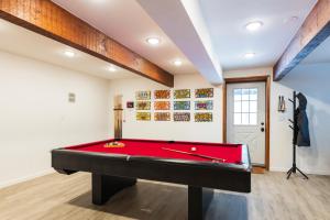 a billiard room with a red pool table at Private Fire Pit Pool Table Barry Manor in Barryville