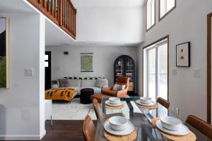 a living room with a table and chairs at Private Fire Pit Pool Table Barry Manor in Barryville