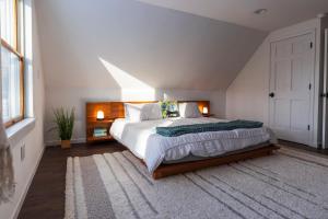a bedroom with a large bed in a attic at Private Fire Pit Pool Table Barry Manor in Barryville